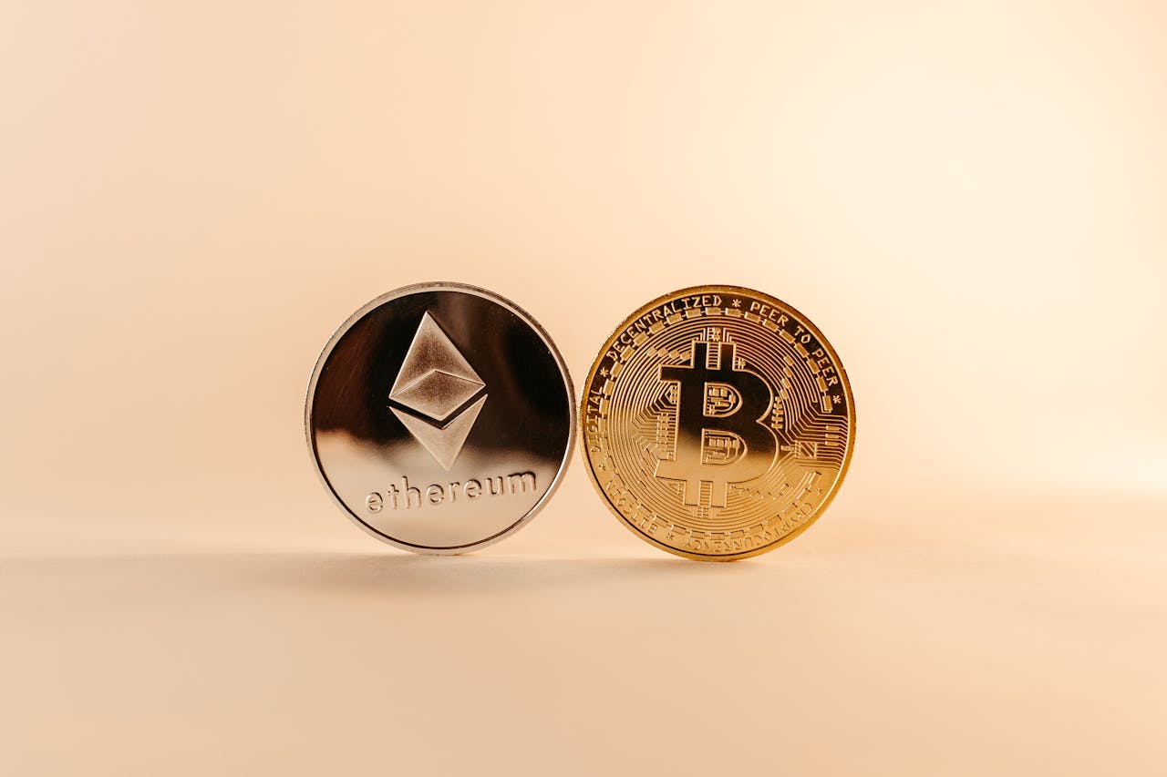 Close-up of Bitcoin and Ethereum coins symbolizing digital currency and blockchain technology.